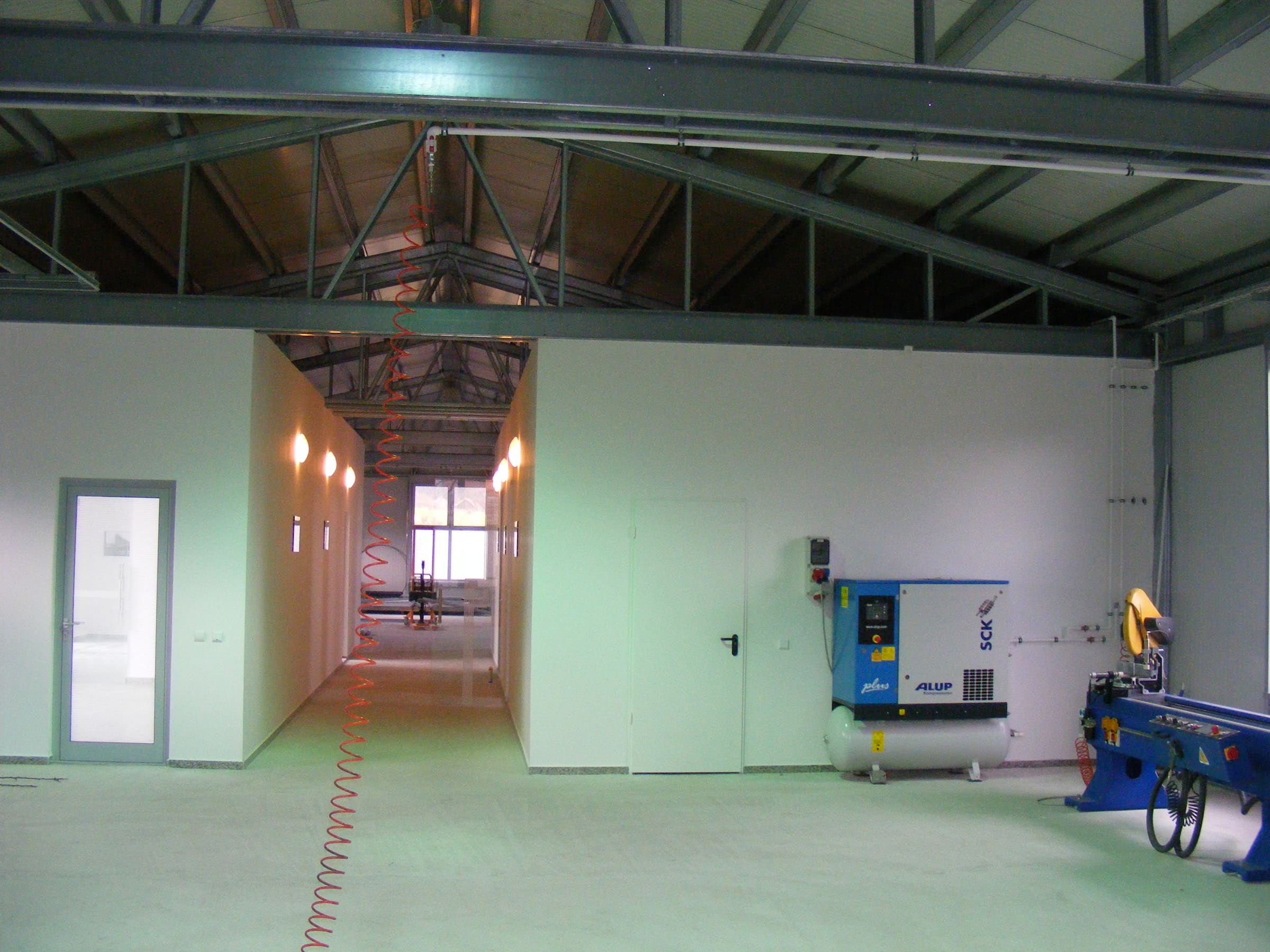 Workshop interior corridor with technical equipment