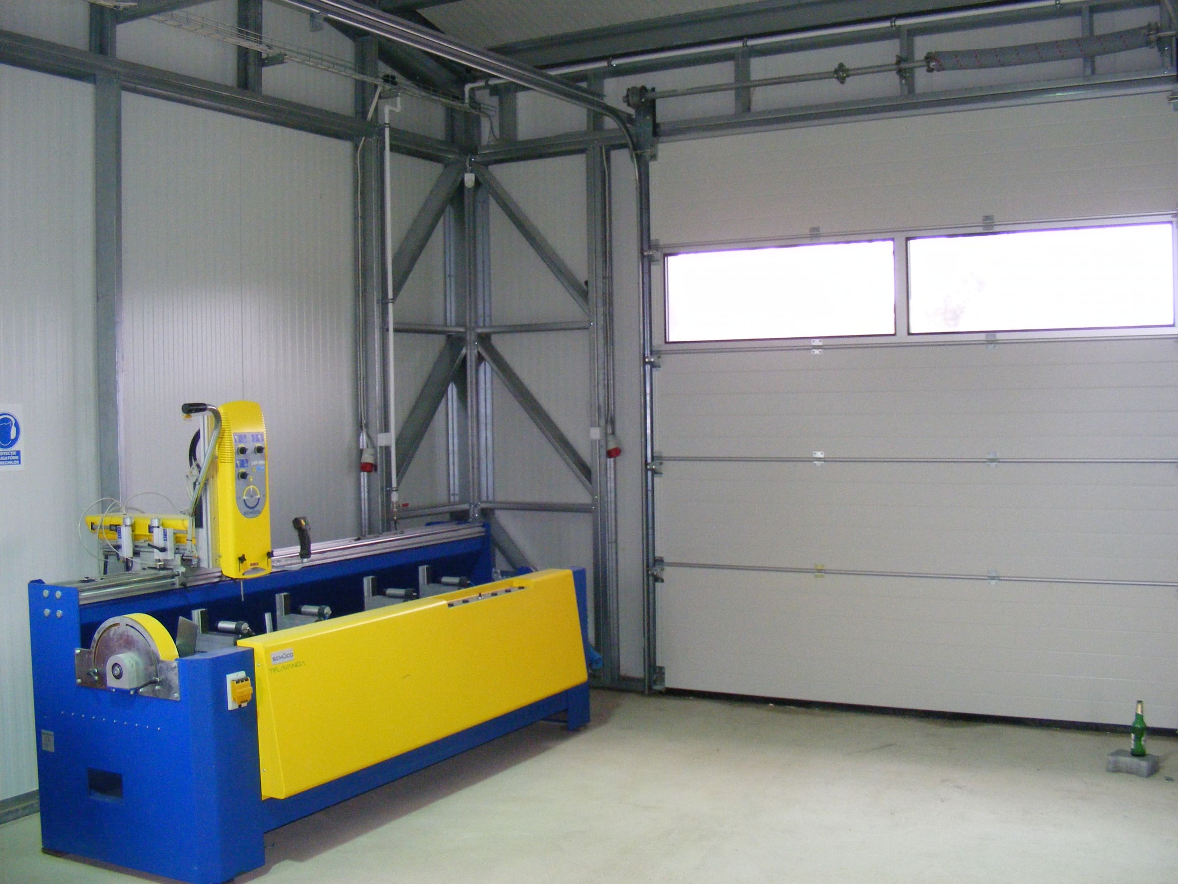 Profile cutting machine on the workshop floor